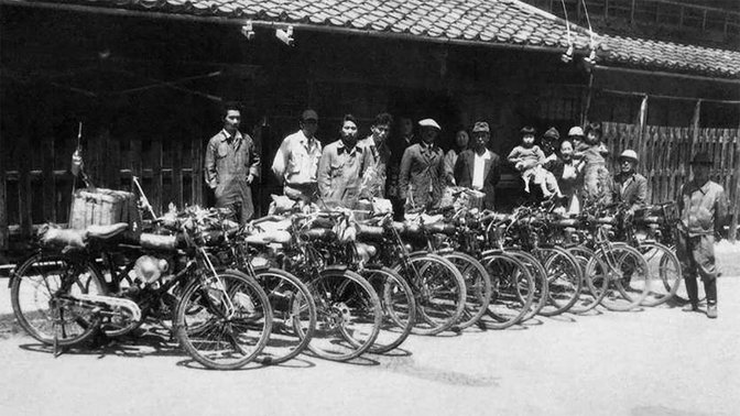 Some of the original Honda employees outside the Hamamatsu factory in 1948.