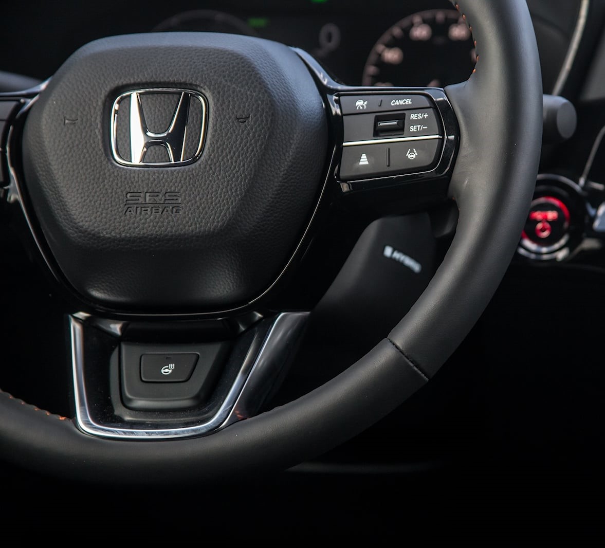 Close up of Honda CR-V multi-functioning steering wheel.