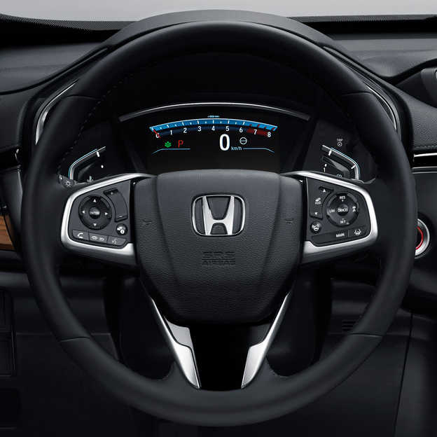 Close up of Honda CR-V multi-functioning steering wheel.